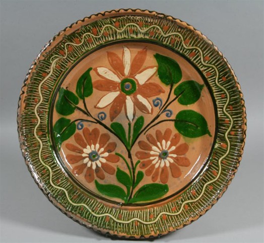 Image -- Ceramic plate. Havrylo and Yavdokha Poshyvailo from Opishnia (Ivan Honchar Museum).