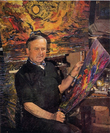 Image -- Mykola Hlushchenko with his paintings.
