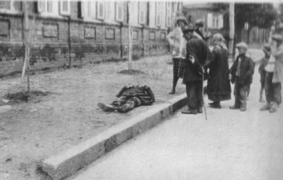 Image -- A corpse on the streets of Kharkiv during the Famine-Genocide (1933).