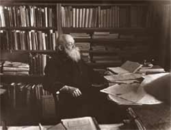 Image -- Mykhailo Hrushevsky in his study in 1929.