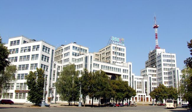 Image -- The Derzhprom (State Industry) complex of high-rise office buildings in Kharkiv (1925-9, designed by Samuil Kravets, Sergei Serafimov, and Mark Felger),