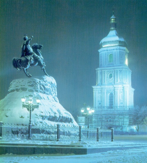 Image -- Monument of Bohdan Khmelnytsky and the bell tower of Saint Sophia Cathedral in wintertime.