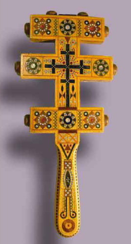 Image -- An encrusted cross by Yurii Korpaniuk