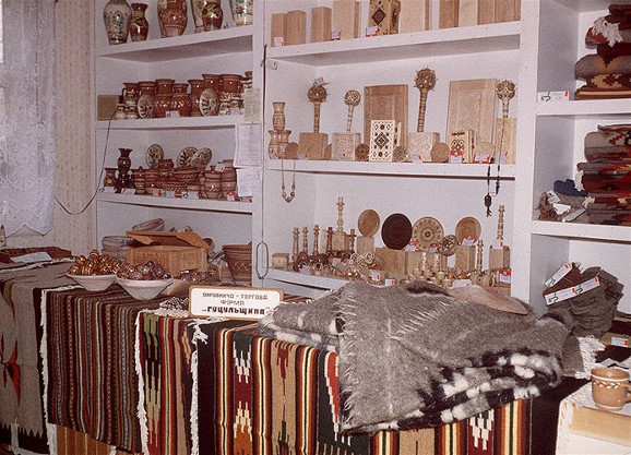Image -- A stand with traditional Hutsul crafts manufactured by the Hutsulshchyna company.