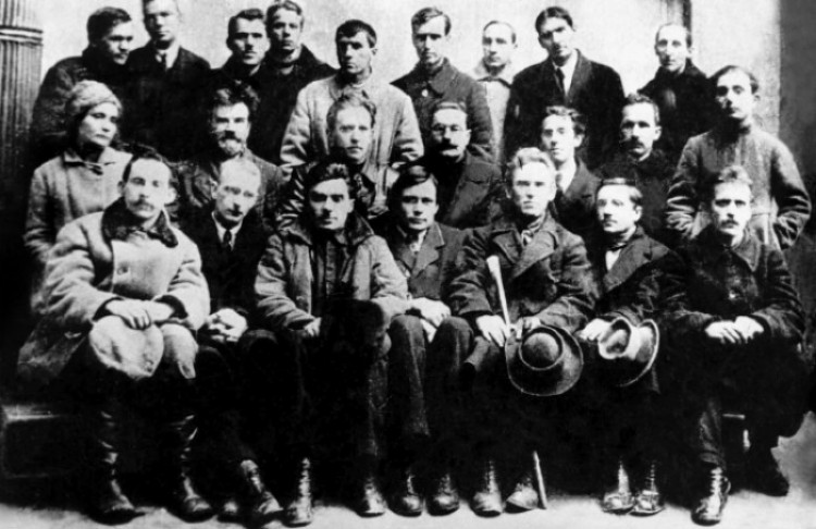 Image -- Pylyp Kozytsky (first from right in the first row) among Ukrainian writers, painters, and composers (Kyiv, 1923).