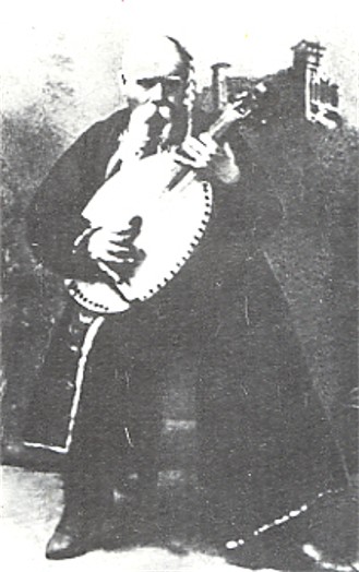 Image -- Marko Kropyvnytsky as Stepan in his play Nevolnyk based on Taras Shevchenko's poem (1872 photo).