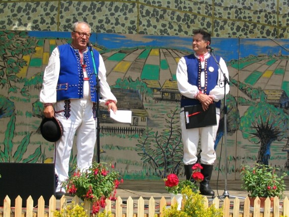 Image -- Men in Lemko folk costumes during a folk performance.