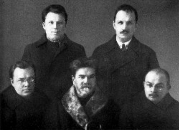 Image -- The Neoclassicists: sitting (f-l): Mykola Zerov, Mykhailo Mohyliansky, Viktor Petrov; standing (l-r): Mykhailo Drai-Khmara, Pavlo Fylypovych.