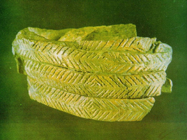 Image -- A Paleolithic bracelet excavated in Mizyn, Chernihiv oblast, ca 15,000 BC (incised mammoth bone).