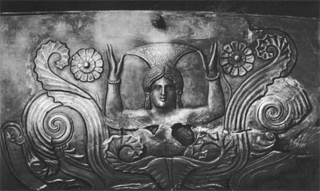 Image -- A detail (depicting the Scythian goddess Agrimpasa) of a Scythian silver amphora from the Chortomlyk kurhan.
