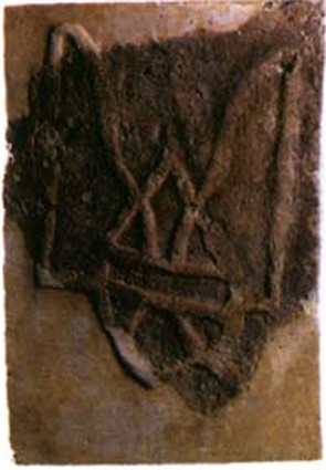 Image -- Trident design on a brick from the Church of the Tithes (10th century).