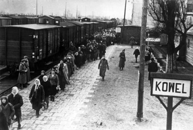 Image -- Ukrainians from Kovel taken to Germany to work as slave laborers (Ostarbeiter) (1942).