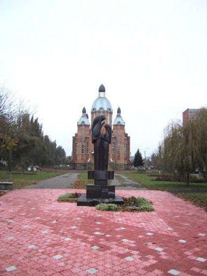 Image -- Vinnytsia: Greek-Catholic Church and the Chornobyl victims monument.